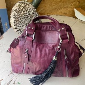 NICOLI brand wine colored purse. Barely used, no flaws